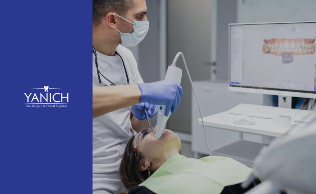 Dr. Yanich performing a dental procedure on a patient.